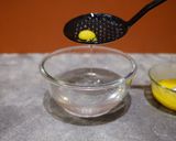 A picture of step 7 of Molecular gastronomy-mango juice spherification.