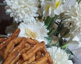 A picture of step 12 of Savory crispy potato churros.