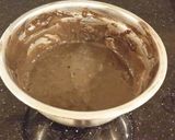 A picture of step 4 of Dark Chocolate Layer Cake with Fresh Strawberry Cream Frosting and Filling.