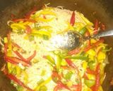 A picture of step 3 of Vegetabled, Jollof spaghetti and crispy fried chicken.