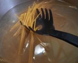 Foto del paso 2 de la receta: Pasta con jamón, hongos y cherry