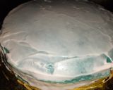 A picture of step 6 of Malai white choco crepe cake.