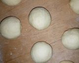 A picture of step 9 of Pumpkin shaped dinner rolls.