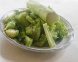 A picture of step 1 of Beans Broccoli poricha koottu with mung.