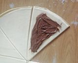 A picture of step 3 of Nutella roll ups.