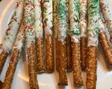 A picture of step 6 of Christmas chocolate covered pretzel rods.