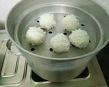 A picture of step 12 of Khichi rice flowers balls.