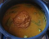 A picture of step 9 of Kerala Style- Drumstick Sambar.