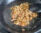 A picture of step 4 of Seafood Paella with Socarrat.