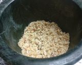 A picture of step 8 of Spnich rabdi with peanuts & Chocolate balls.