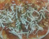 A picture of step 3 of Indian style cheese paneer veg pizza paratha.