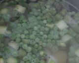 A picture of step 8 of Pappadelle Pasta with Asparagus, Saffron + Peas.