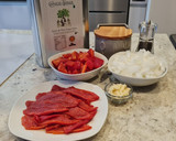 Foto del paso 1 de la receta: Rollitos de pollo y jamón en salsa de pimientos del piquillo