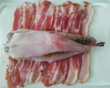 A picture of step 3 of Monkfish Roast Wrapped in Bacon with Fennel.