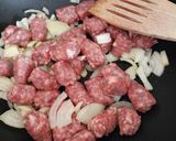 A picture of step 2 of Bangers beans and mash.