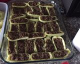 صورة لخطوة 4 من وصفة قوارب الكوسا بالبشاميل