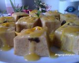 Foto del paso 5 de la receta: Pudín de croissants con crema de naranja
