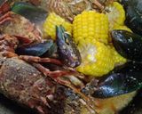 Foto langkah ke 4 dari resep Lobster Kerang Hijau Saus Padang.