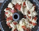 A picture of step 4 of Pizza monkey bread.