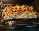 A picture of step 10 of Chicken breast on a bed of sauted apples and onions.