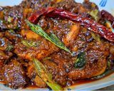 A picture of step 6 of Spicy chicken curry.