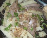A picture of step 6 of Garlic buttery potato wedges.