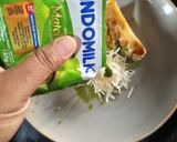 Foto langkah ke 4 dari resep Roti Panggang Keju Matcha.