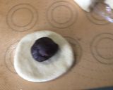A picture of step 6 of Easter bunny milk rolls with red bean.
