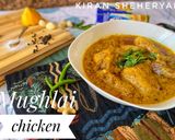 A picture of step 10 of Mughlai chicken.