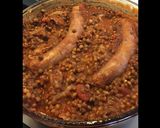 Une image de l'étape 4 de Saucisses aux lentilles tomates et oignons.