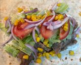 Foto del paso 3 de la receta: Wrap de cerdo estilo Kebab con salsa de yogur