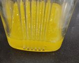 A picture of step 1 of Mix yellow drink.