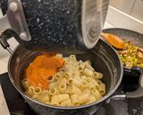 A picture of step 6 of Pasta alla vodka, with pork and sprouts.