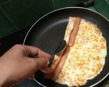 Foto langkah ke 8 dari resep Telur dadar gulung isi sosis.