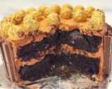 A picture of step 17 of Kit Kat Chocolate cake.