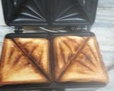 A picture of step 3 of Paneer capcicum carrot sandwich.