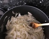 A picture of step 2 of Baked Mussakhan on bread.