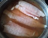 Foto del paso 3 de la receta: Merluza y arroz al vapor en 1 paso