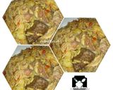 A picture of step 9 of Jollof rice with irish potato.