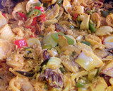 Foto del paso 4 de la receta: Arroz con chipirones y almejas🥘