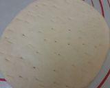 A picture of step 4 of Paneer Tikka Cheese Burst Pizza, without oven.
