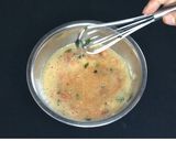 A picture of step 2 of Cheese Omelette.