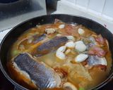 Foto del paso 7 de la receta Lomos de merluza con langostinos