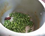 A picture of step 1 of Beans Poriyal.