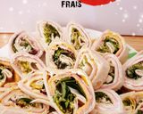 A picture of step 3 of Mini Ham and Cream Cheese Wraps.