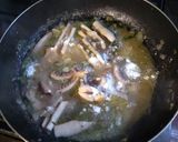 Foto del paso 3 de la receta: Calamar al vino blanco con arroz