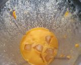 A picture of step 3 of Mango smoothie with lemon.