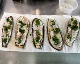Une image de l'étape 11 de Millefeuilles d’aubergines grillées au labneh, épices et persil.