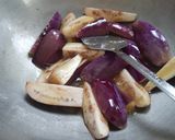A picture of step 4 of Banana flowers dip in mustard seeds.
