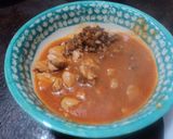 A picture of step 4 of Pork in Milpa Tomato Sauce with Green Chiles and Epazote.